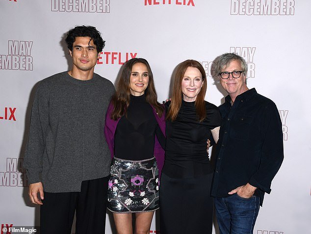 Charles Melton, Natalie Portman, Julianne Moore and director Todd Haynes pose together during a Netflix photocall