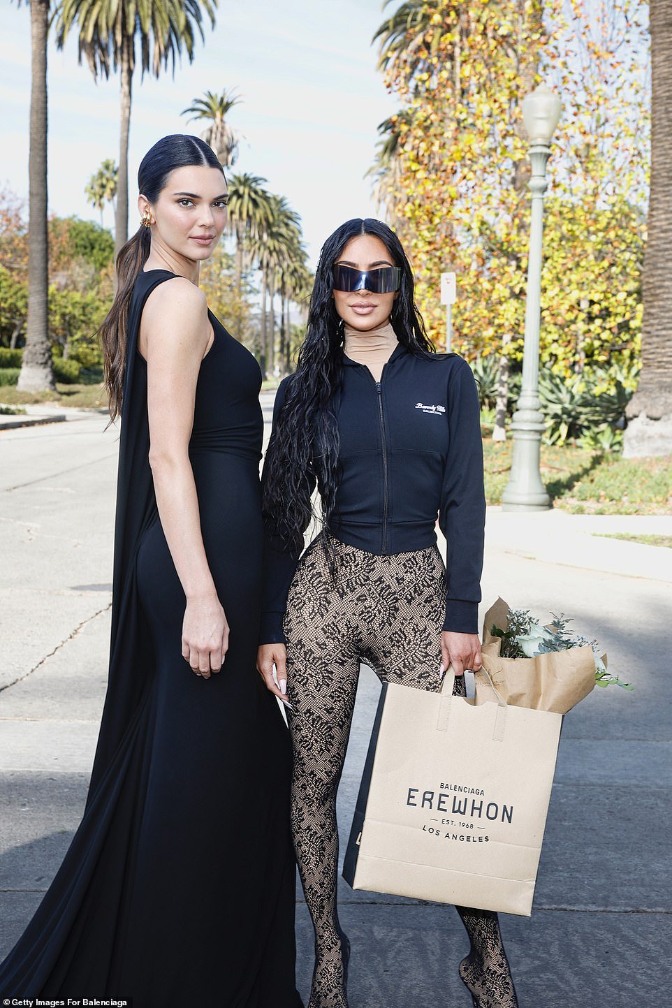 She was joined by sister Kendall Jenner, 28, who stunned in a sleeveless black maxi dress