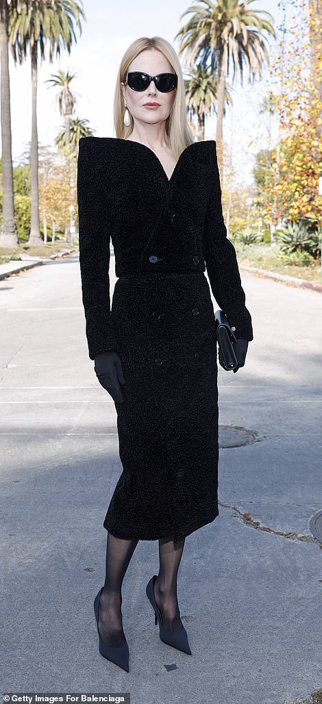 Kidman, 56, looked stylish in a black velvet jacket dress with a stylish open shoulder design