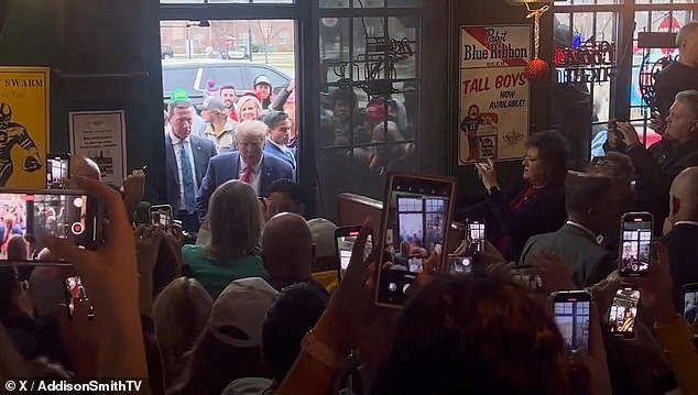 After one of his previous rallies in Ankeny today, the former POTUS received a warm and cheerful welcome at the Whiskey River Bar