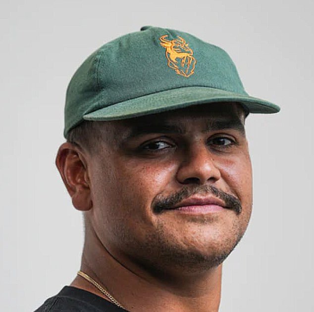 Mitchell models his new green cap with a wide brim that makes it look suspiciously like the famous Baggy Green of the Australian Test Cricket Team