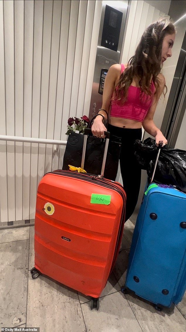 Daily Mail Australia has obtained exclusive photos of the 27-year-old looking dejected as she left her accommodation on July 31.