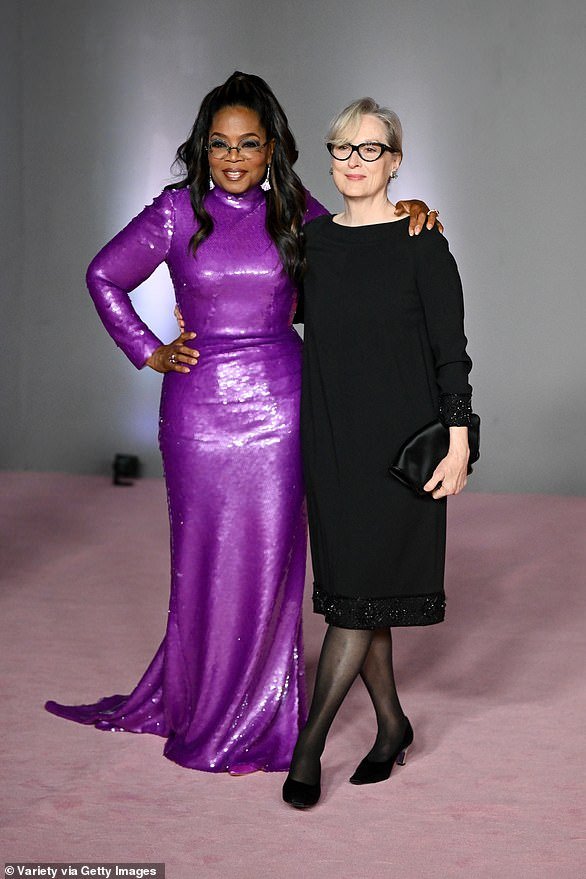 Oprah Winfrey and Meryl Streep were two of the four winners as they posed together on the red carpet