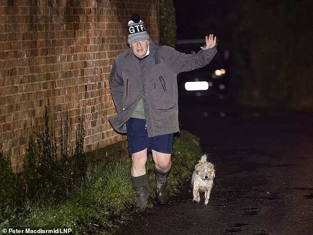 Mr Johnson goes for a morning run near his home in Oxfordshire on the eve of giving evidence to the inquiry