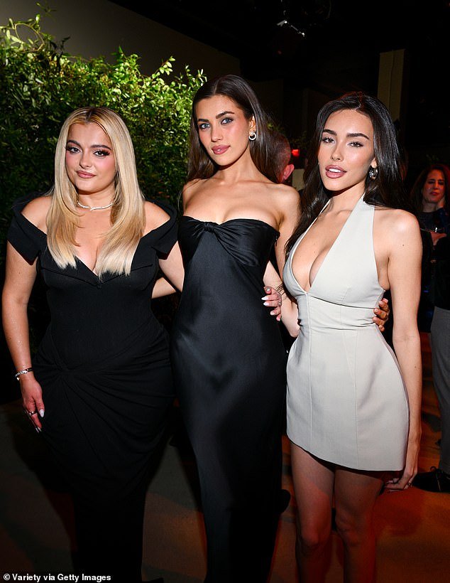 At the event, Madison was seen catching up with fellow singer-songwriter Bebe Rexha and actress and model Amelie Zilber, who both contrasted hers with their black dresses.