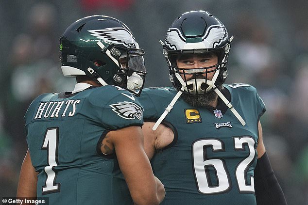 Jalen Hurts and Jason Kelce (right) talk during Sunday's loss to San Francisco