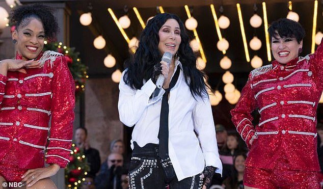 Hard at work: Cher, 77, has been accused of lip-syncing during her performance at the Macy's Thanksgiving Day Parade in New York