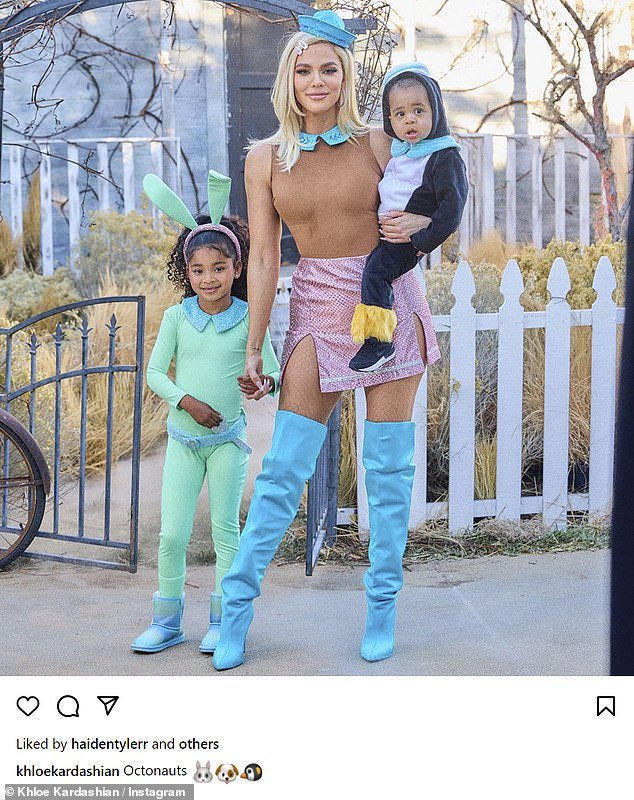 Khloe is pictured with her and Tristan's little bundles of joy - True, five, and Tatum, 15 months - celebrating Halloween a few months ago