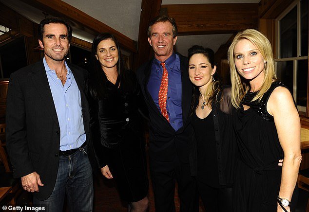 Kennedy seen with ex-wife Mary in a photo with his now current wife, actress Cheryl Hines (pictured right)