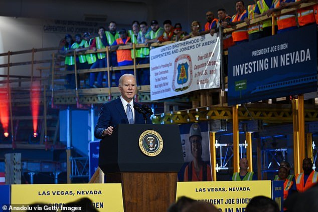 Biden told the crowd of union workers at a lumber yard that, unlike Donald Trump, he was 'walking the walk'