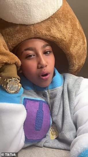 North shared several videos of herself, dressed in the bear suit, dancing along to some of her dad's old songs