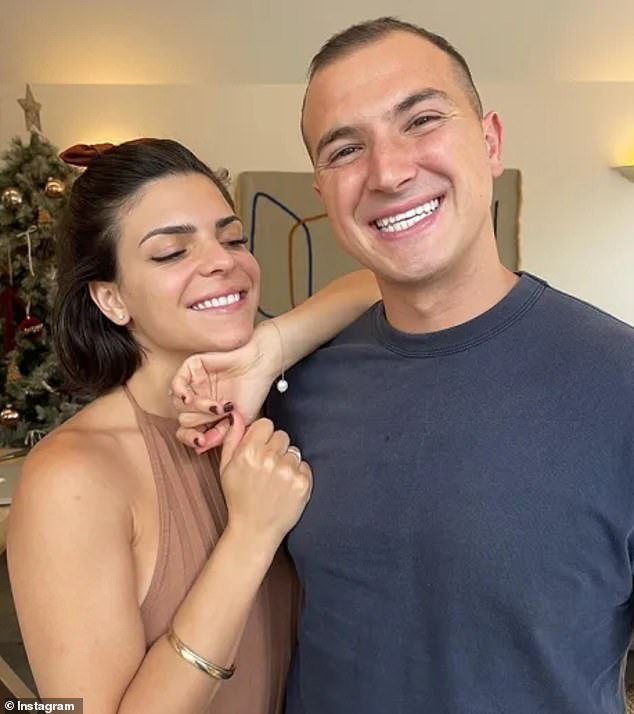 Posting to Instagram on Wednesday, Gian revealed that the couple indulged in a teeth whitening treatment.  Pictured: The happy couple shows off their 'fresh' smiles