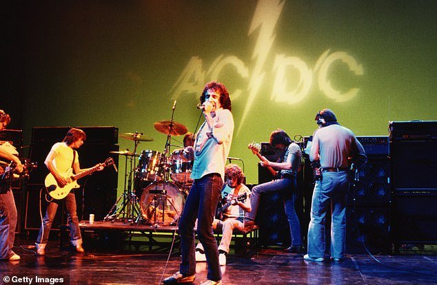 Foo Fighters have included AC/DC's raunchy 1976 song Big Balls in their set.  Pictured: AC/DC rehearsing in the US in 1977
