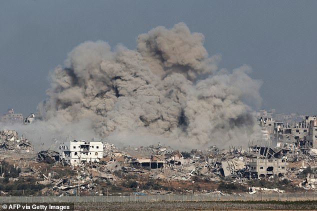 Smoke rises from the Gaza Strip as Israeli attacks across the region