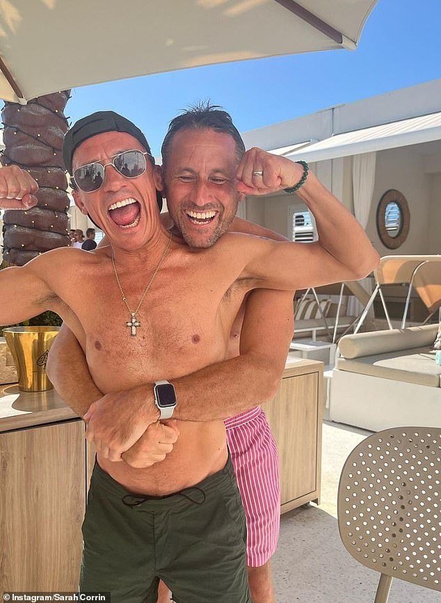 Actor Nick hugged jockey Frankie and wrapped his arms around his waist for another photo taken at the beach club