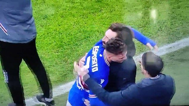 Despite being shaken 'like a rag doll', Pirlo hugs his striker as they celebrate victory