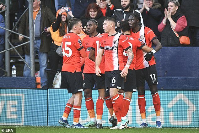 Luton Town shocked champions Manchester City by taking the lead in first-half stoppage time