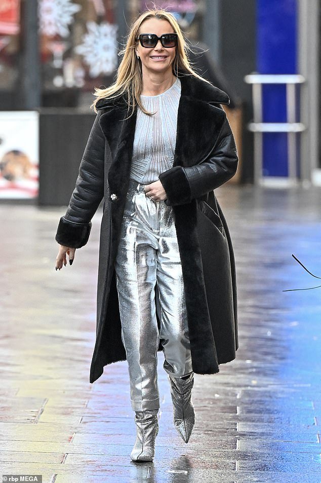 Amanda paired the all silver pants with a glitter silver striped top and ankle boots covered in sparkling silver rhinestones