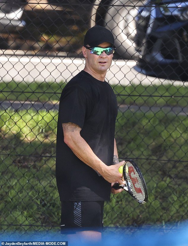 The former cricket captain, 42, was spotted hitting a few balls with the blonde on the tennis court