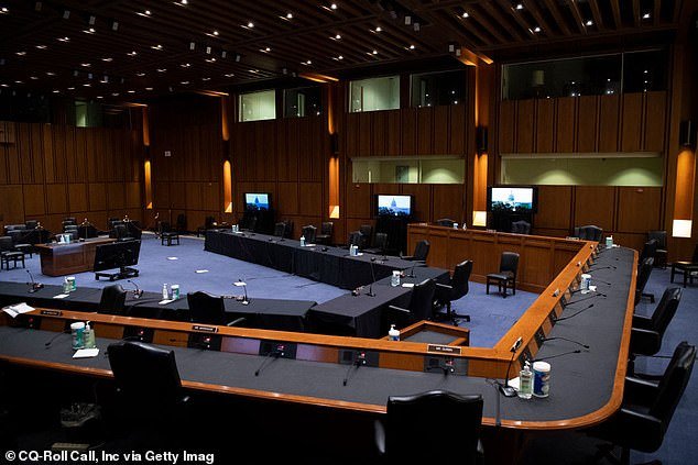 The congressional staffer is accused of filming the explicit images in a hearing room in the Hart Senate Office Building (pictured)