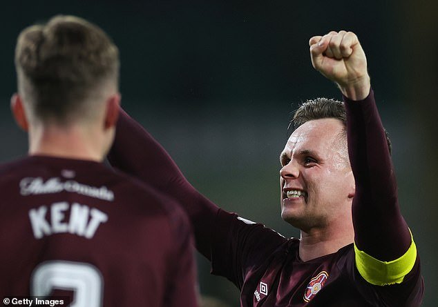 Lawrence Shankland of Hearts celebrates at full-time after scoring to help secure three points