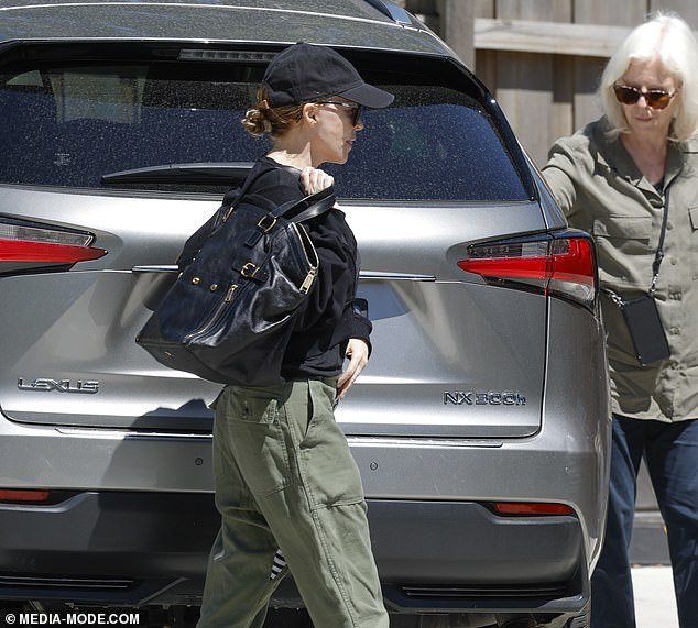 On Friday, Kylie cut a casual figure as she was spotted in Melbourne with her mother Carol (left)