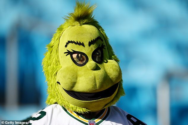 A Packers fan dressed as the Grinch was also in the stands at Bank of America Stadium