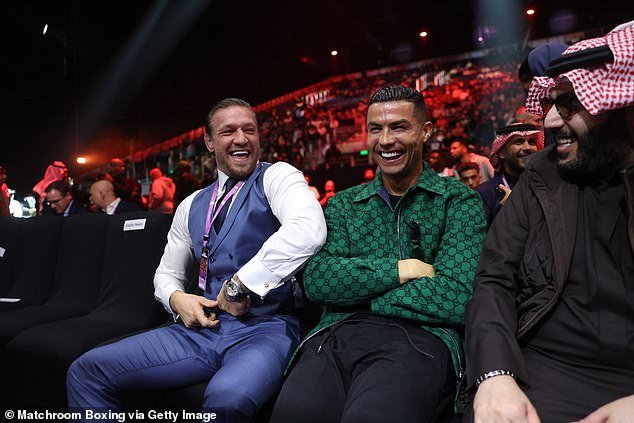 The Portuguese star was pictured laughing and chatting with McGregor at the event