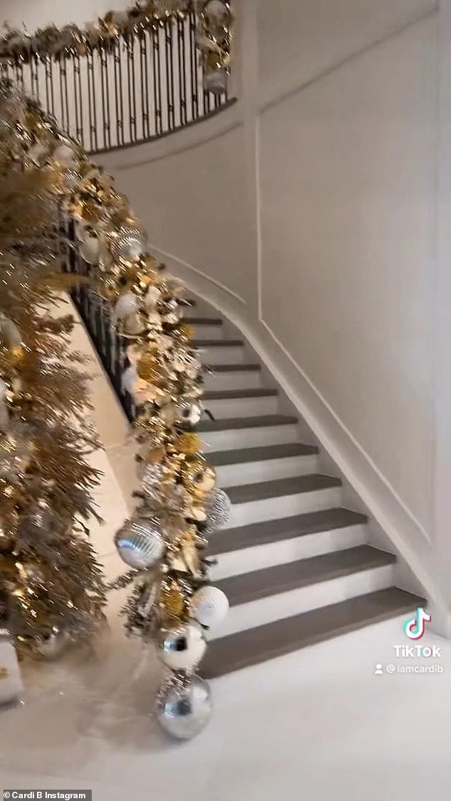 The home's stairs were lined with decorations on Christmas Eve