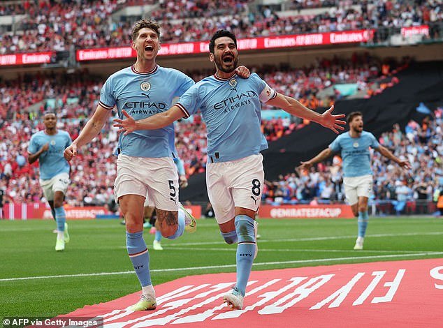 Ilkay Gundogan (right) scored a stunning volley to put Manchester City ahead in the FA Cup final
