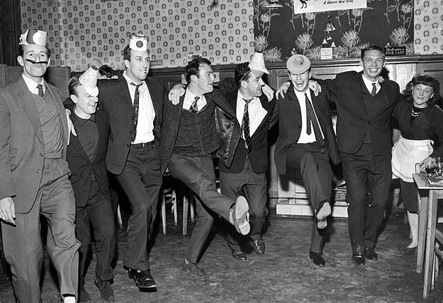 Greaves is in front of the camera this time at Tottenham's Christmas party as he dances with his teammates (from left to right - Tony Marchi, Terry Tyson, John Hollowbread, Greaves, Dave McKay, John White and Freddie Sharpe)
