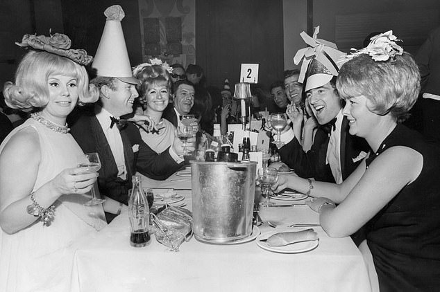 Bobby Moore (second from left) and wife Tina enjoy the company of Mr and Mrs Terry Venables at a New Year's Eve party in 1967