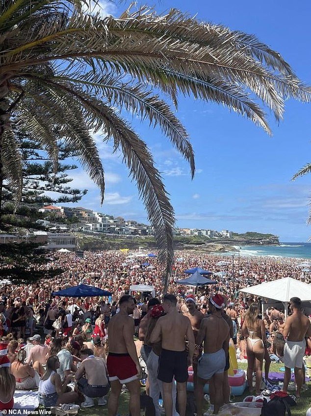 On Monday, a huge crowd gathered on the beach to celebrate Christmas Day