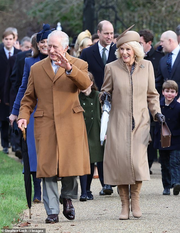 King Charles waved to the crowd as he and Queen Camilla walked to the small chapel