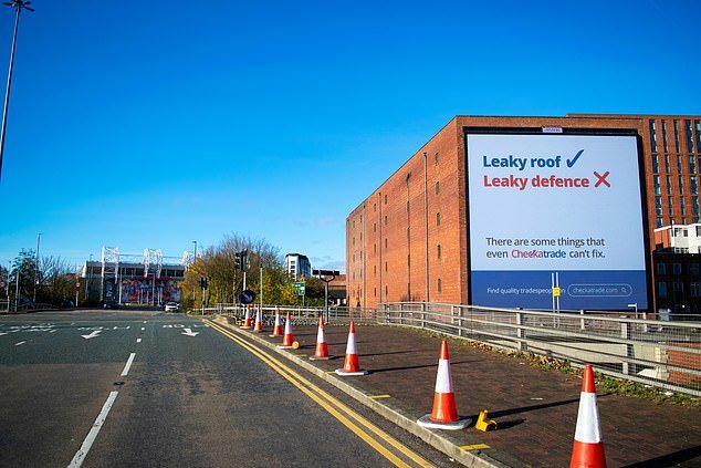 Checkatrade mocked Old Trafford's leaky roof last month with a poster just steps from the stadium