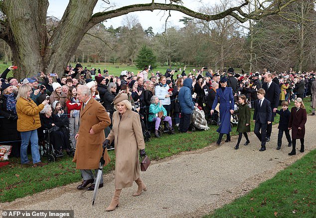 King Charles was seen waving to the crowds gathered outside Norfolk Church to wish him and his family well this Christmas as he walked alongside Queen Camilla.