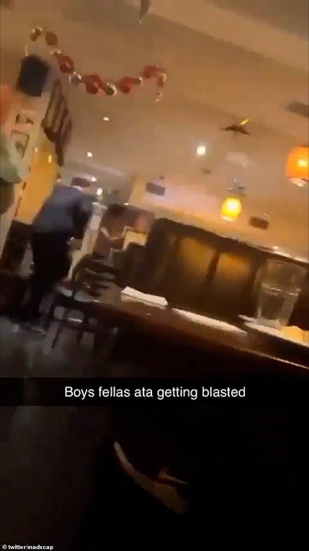 This is the shocking moment a restaurant shouts 'someone is about to punch me in front of my eyes' as a gunman storms a Dublin steakhouse and fires on a father and son