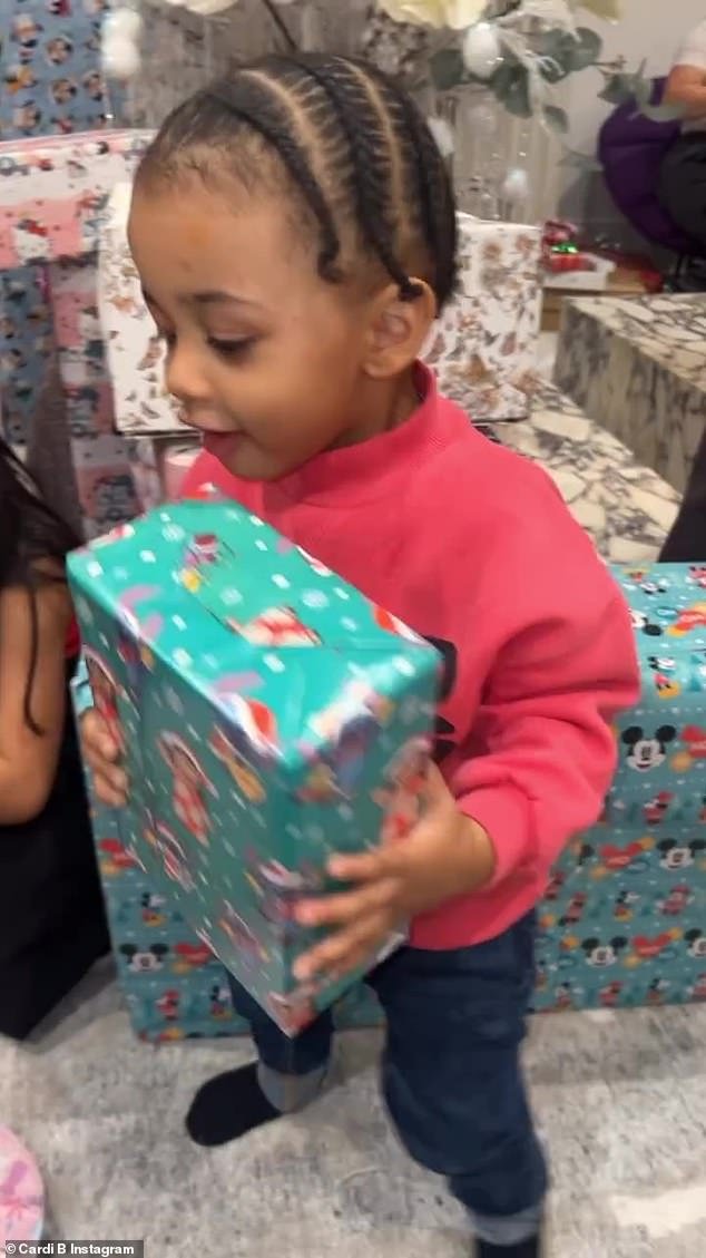 Sweet: In an Instagram story uploaded by the Grammy-winning rapper, 31, on Monday, the former couple's children looked overjoyed as they opened presents as a family