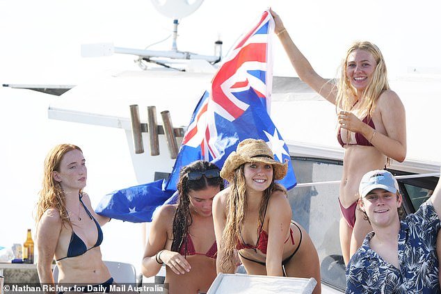 There are increasing calls to change the date of Australia Day (revelers in the photo).