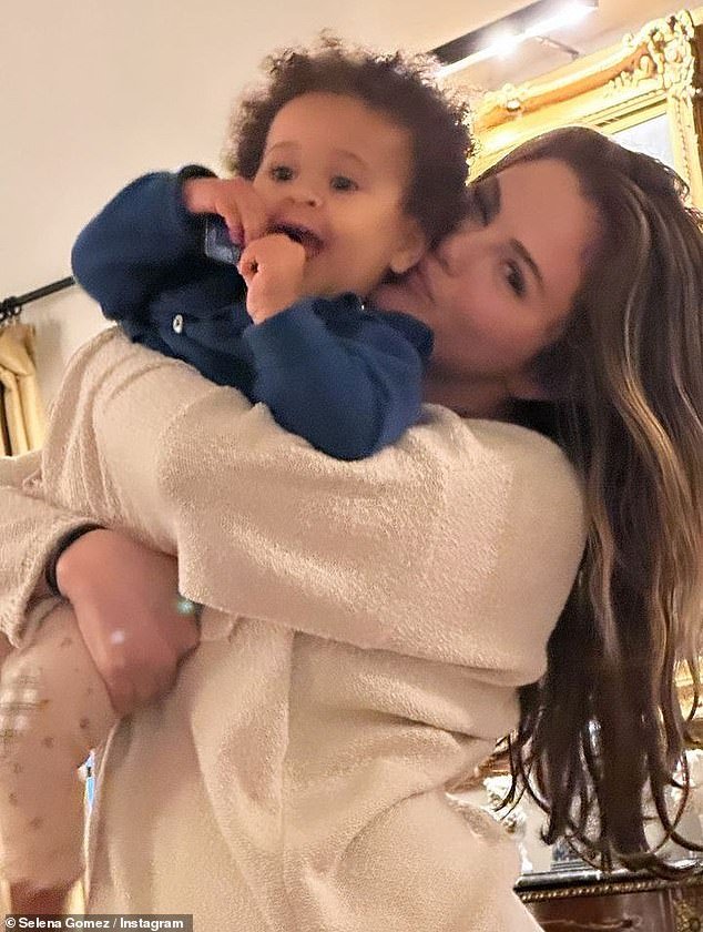 The Lose You to Love Me singer also shared an adorable photo of herself holding one of her friends' babies