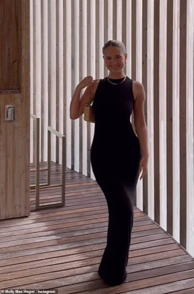 The day before, Molly-Mae shared a clip of herself wearing a black racer neck maxi dress, which showed off her incredible figure