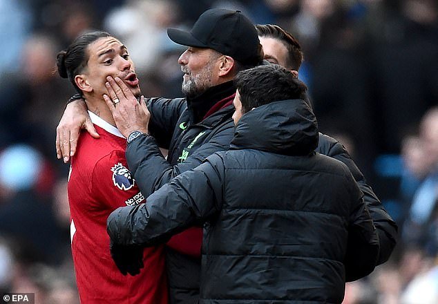 Darwin Nunez had to be restrained by manager Jurgen Klopp after his altercation with Pep Guardiola