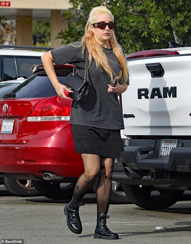 Amanda Bynes cut a very casual figure during a day of shopping in Beverly Hills on Wednesday morning