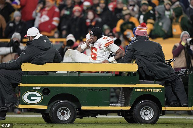 Chiefs safety Bryan Cook was carted off the field against the Packers with an ankle injury