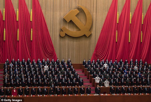 Chinese President Xi Jinping, bottom center, and senior members of the government are seen at the 20th National Congress of the Communist Party of China in October 2022