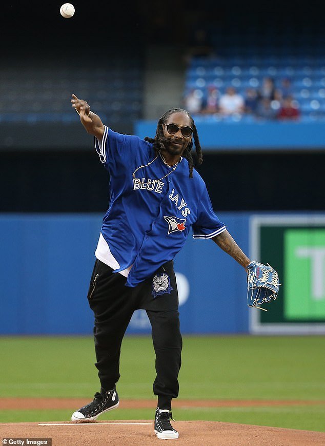 Hip-hop legend Snoop Dogg (pictured) is one of many celebrities to have thrown out the first pitch for an MLB baseball game in the United States
