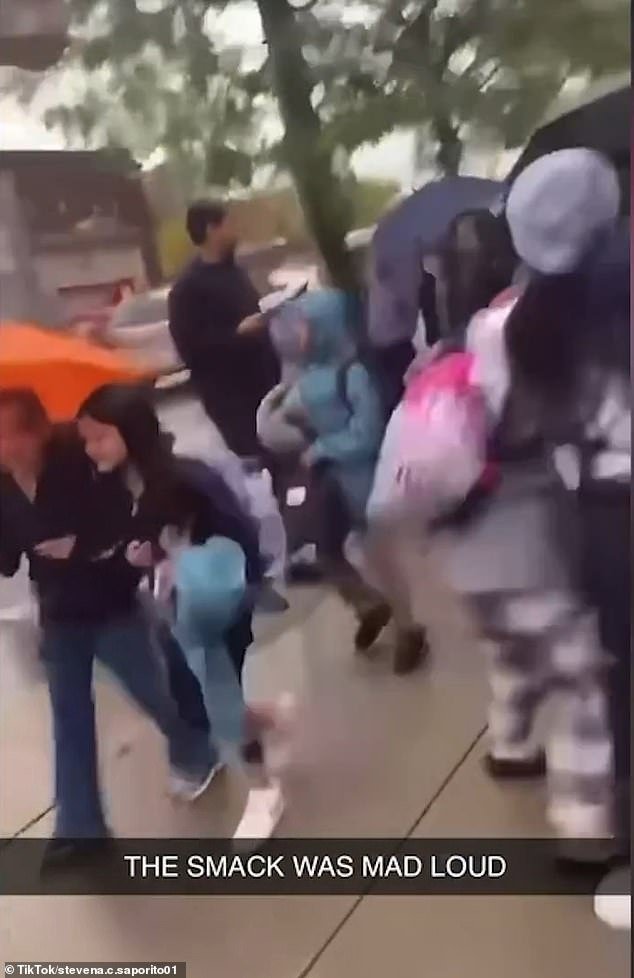 Student laughed and filmed as 11-year-old was approached from behind and knocked to the ground in front of shocked pedestrians