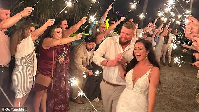 Samantha Miller, 34, and Aric Hutchinson, 36, are pictured on their wedding day on April 28.  She would be killed by a drunk driver shortly after this photo was taken
