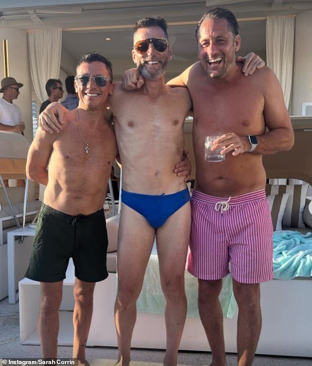 (L-R) Frankie Dettori, Fred Sirieix and Nick Pickard posed in their swimwear for some snaps as they enjoyed a boozy day at a beach club in Australia after leaving the I'm A Celebrity jungle