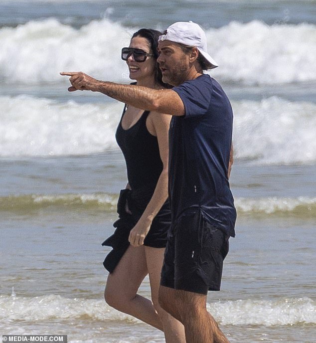 Erica Packer, the ex-wife of billionaire casino magnate James Packer, debuted her surprise new romance with celebrity chef Shannon Bennett during a romantic beach walk in Byron Bay this week.